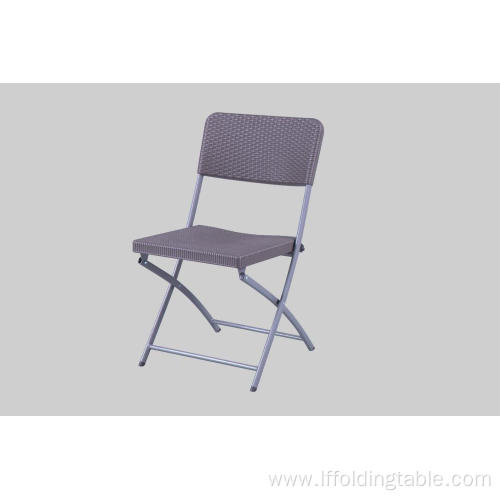 Plastic rattan chair with metal legs